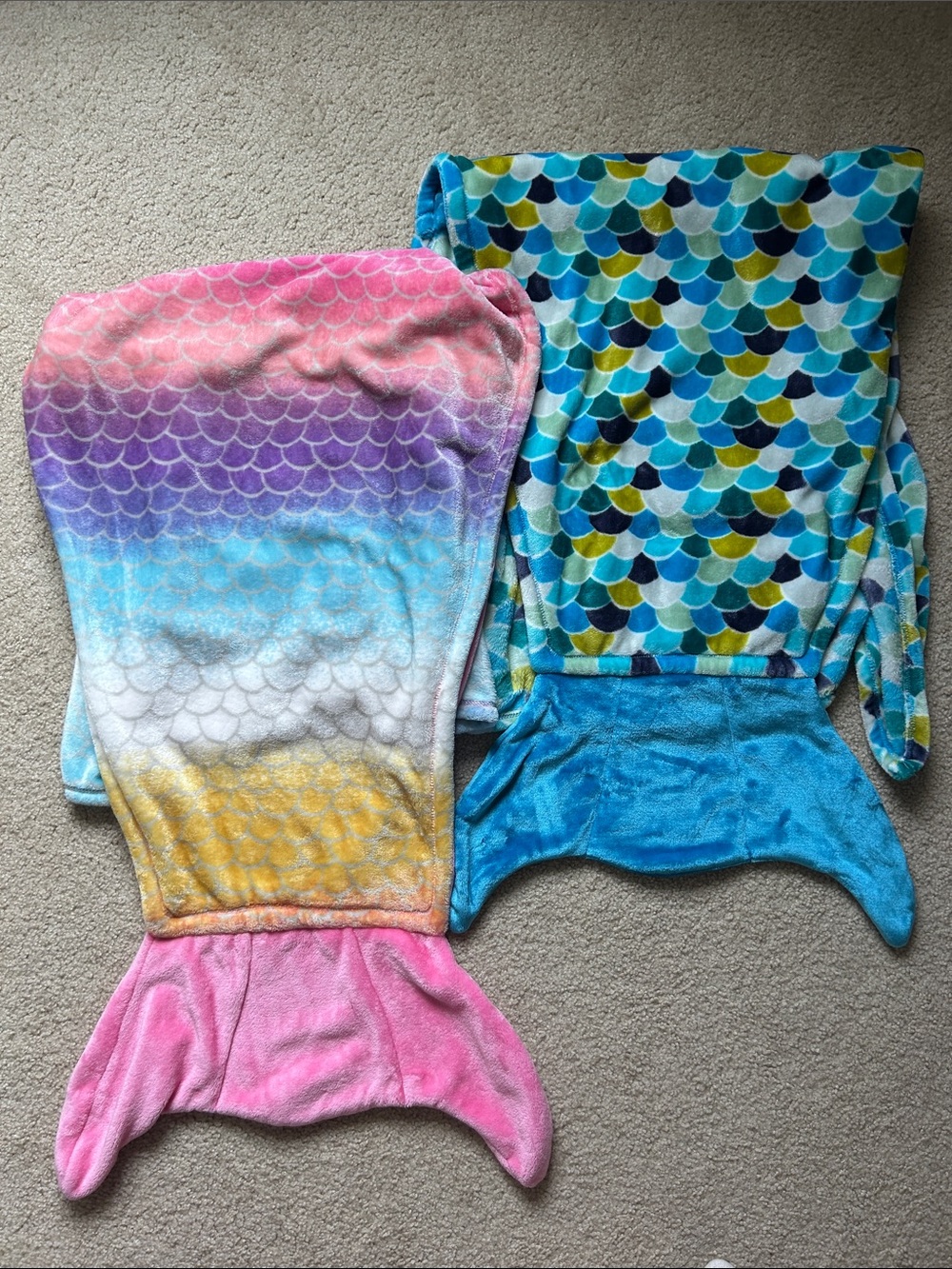 Cuddly Buddies pair of colorful mermaid tail blankets